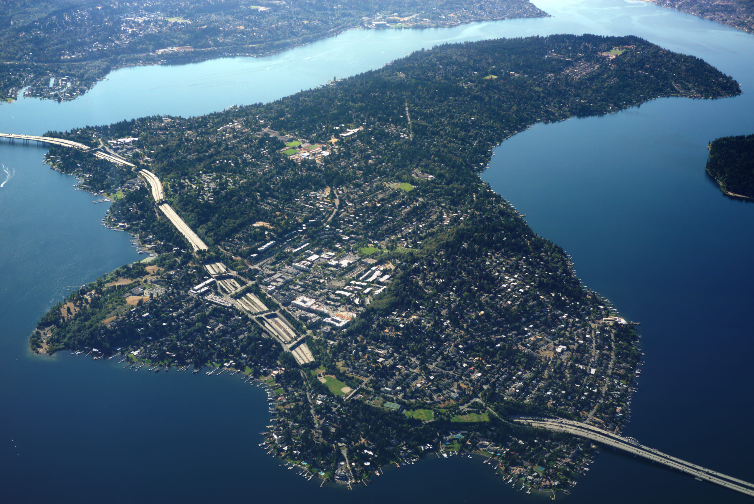 Pelican Heating & Air technician repairing a ductless mini-split unit on Mercer Island