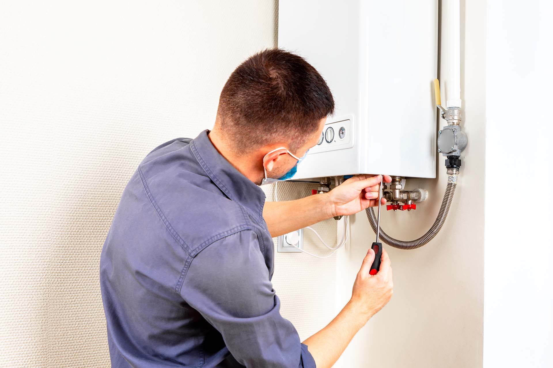 Expert technician conducting a thorough inspection and installation of a heating system in Mercer Island