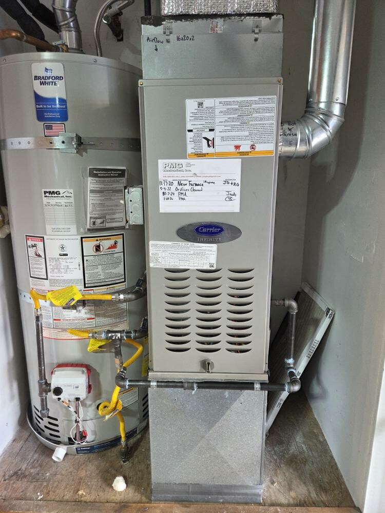 New furnace installation in progress by licensed HVAC contractor from Pelican Heating and Air