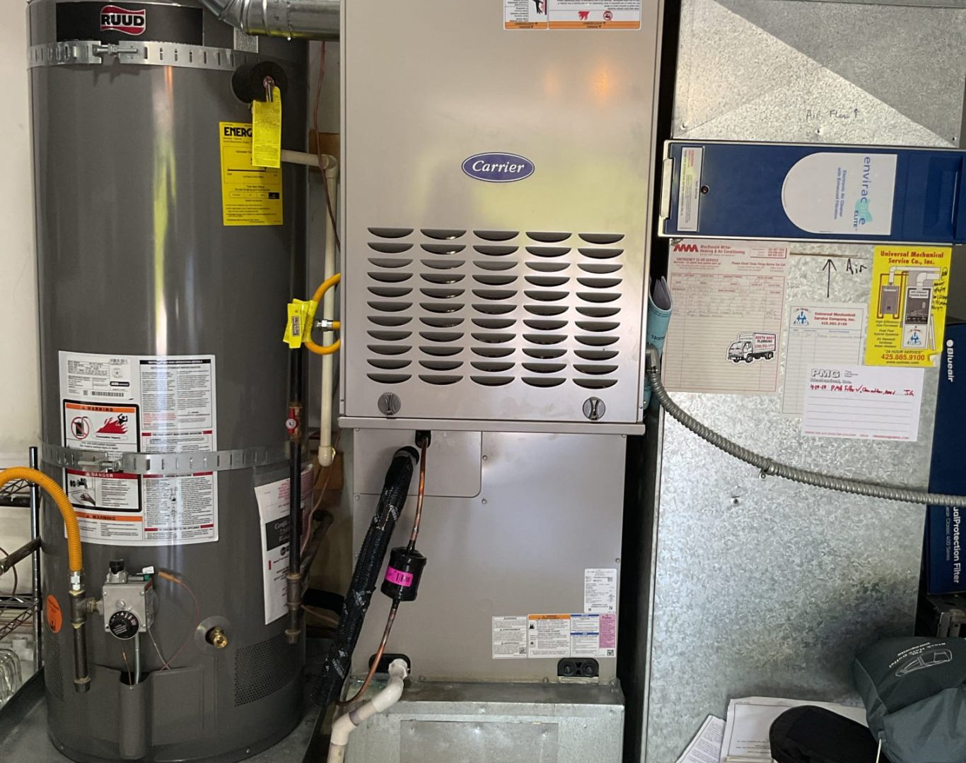 Technician performing Boiler Service in a Mercer Island, WA basement while testing circulation controls