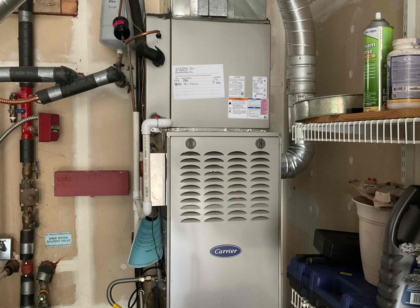 Pelican Heating and Air technician servicing a residential air conditioning unit in Bellevue, WA