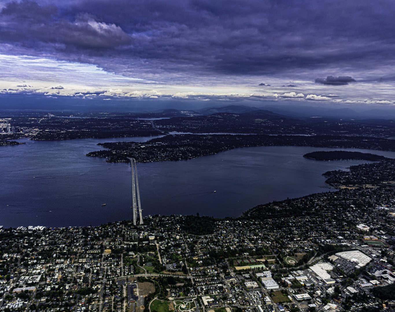 Pelican Heating & Air technician repairing a ductless mini-split unit on Mercer Island