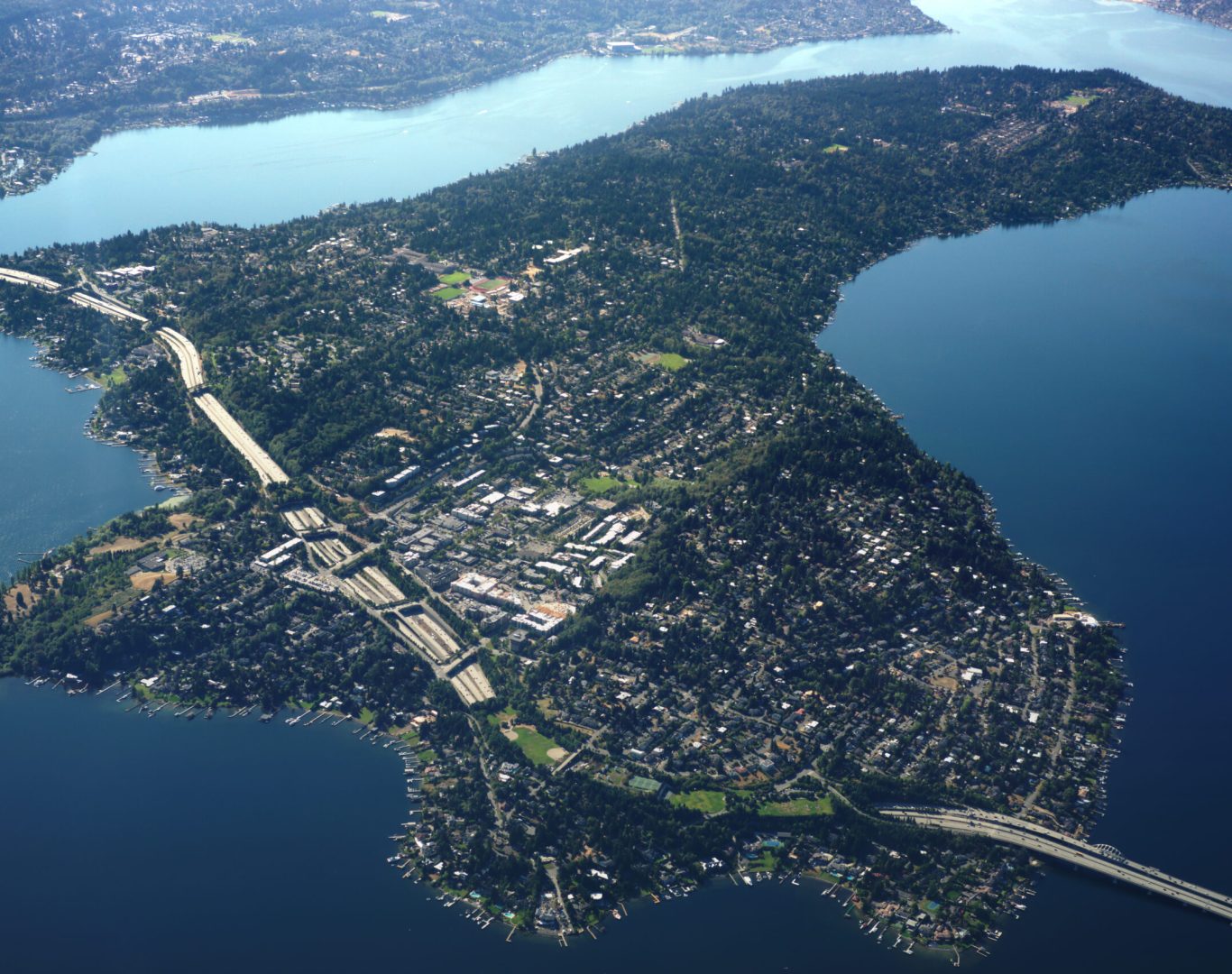Pelican Heating & Air technician repairing a ductless mini-split unit on Mercer Island
