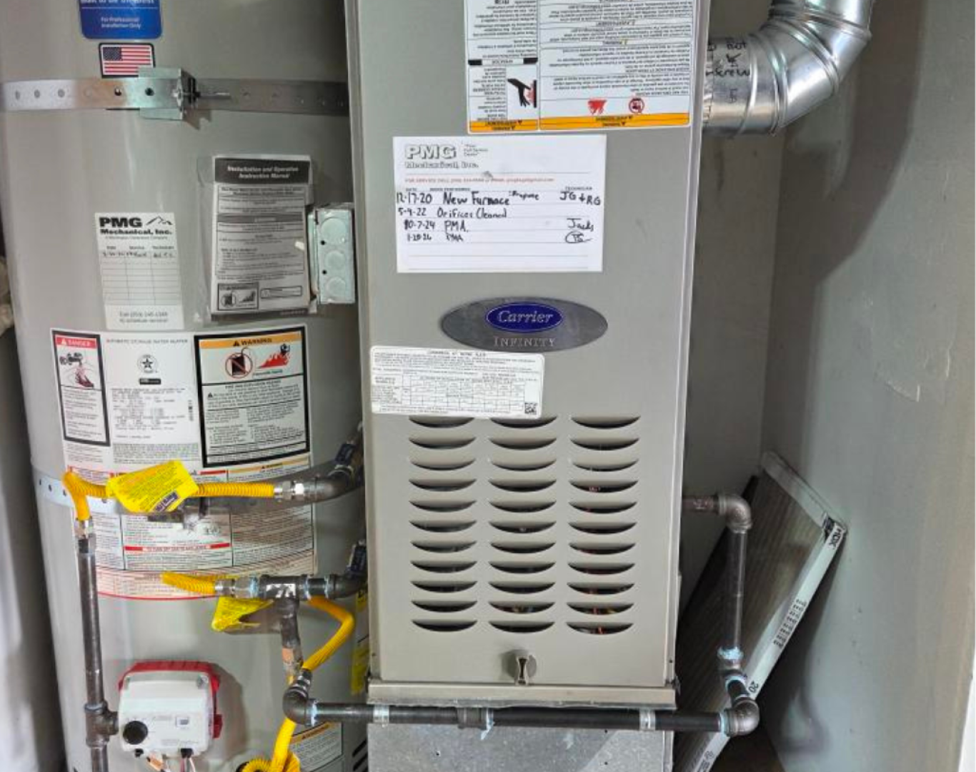 Pelican Heating & Air technician expertly cleaning a furnace in Mercer Island, ensuring optimal efficiency and safety