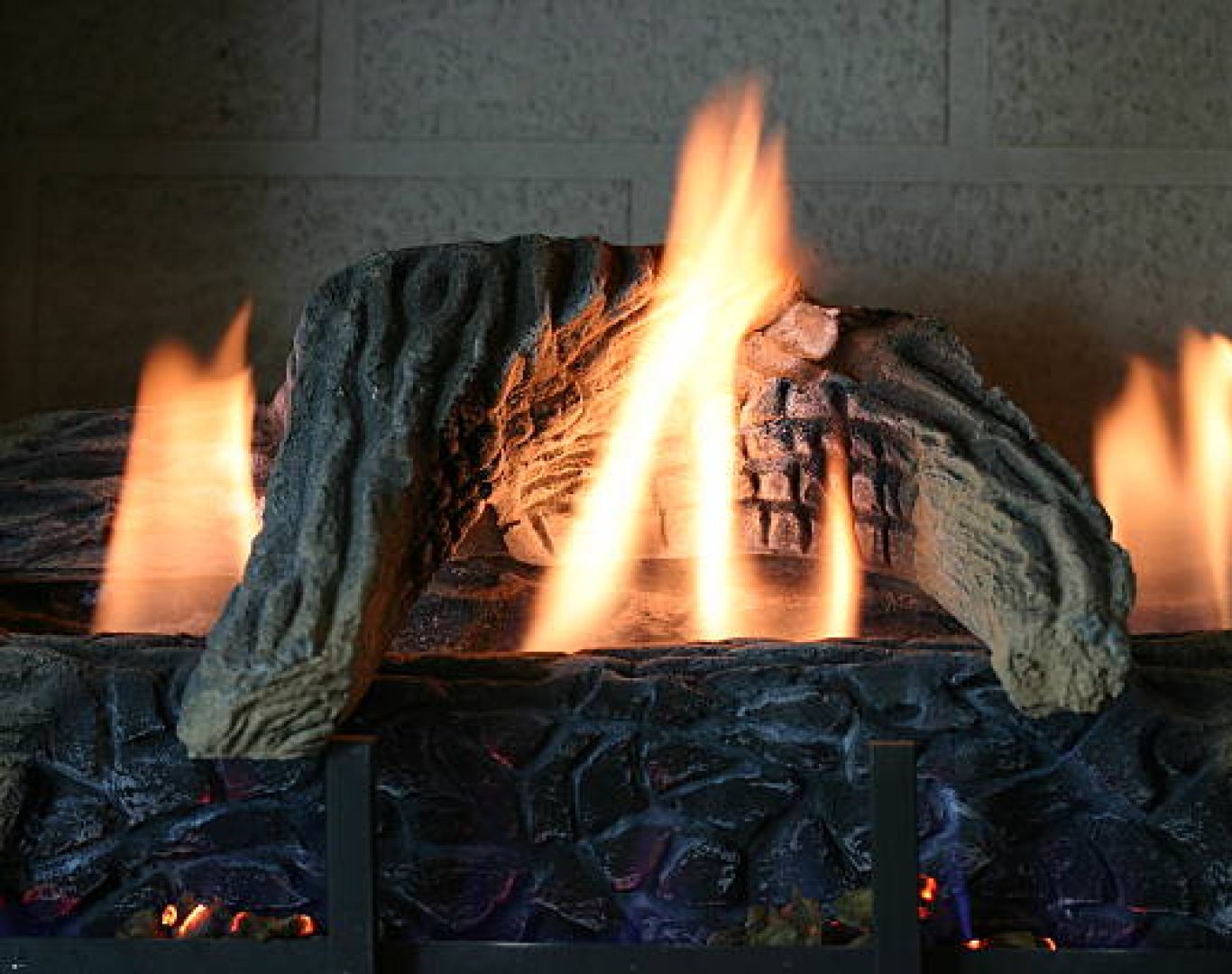 Specialist completing Gas Fireplace Repair inside a Newcastle , WA living room while testing venting and ignition