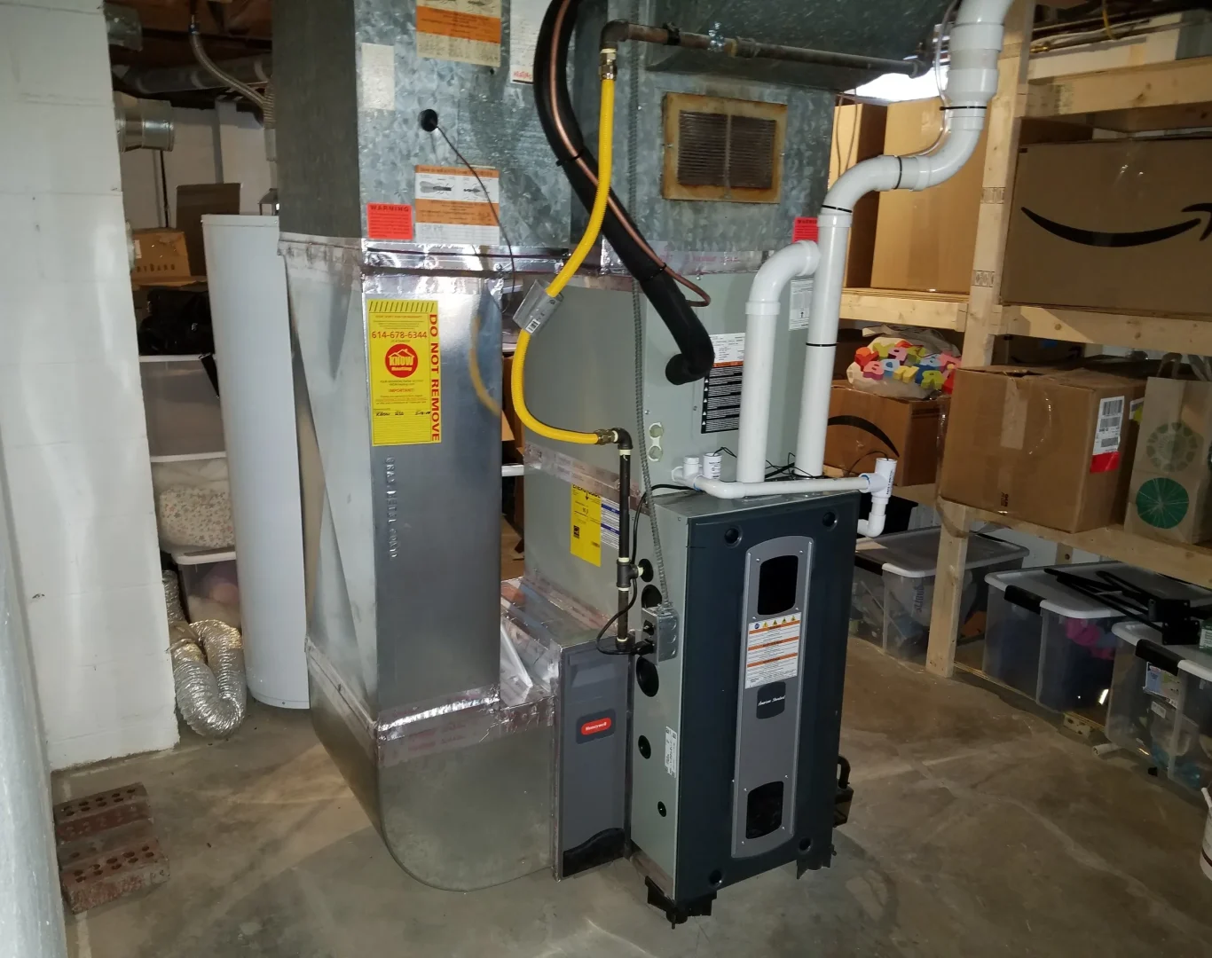 New furnace installation in progress by licensed HVAC contractor from Pelican Heating and Air