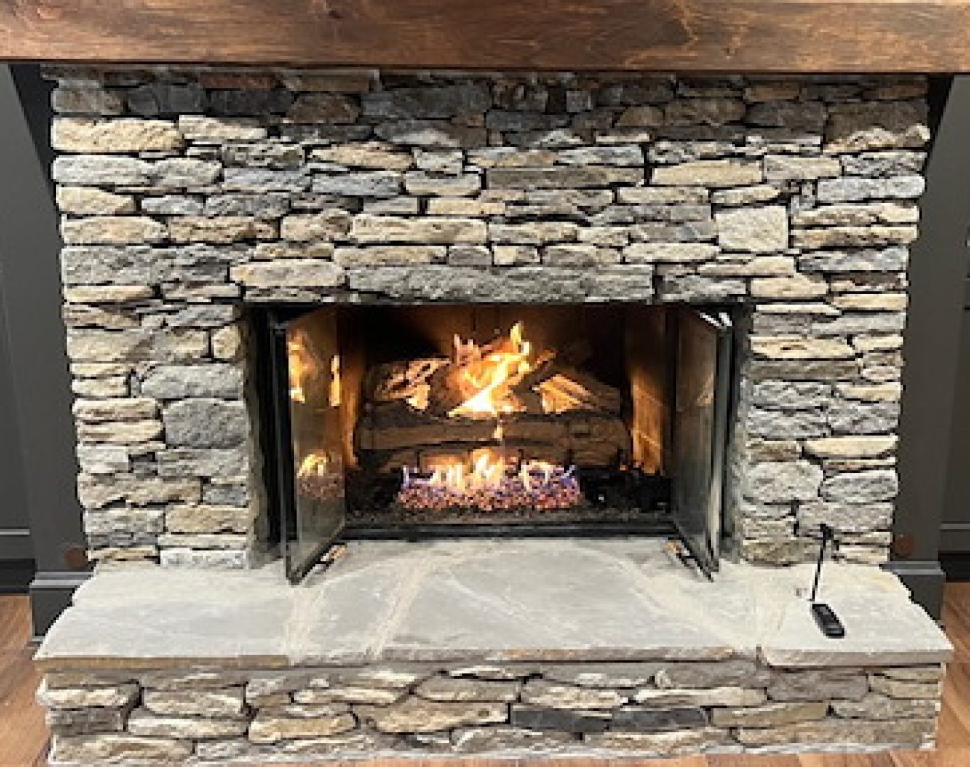 Expert technician checking gas fireplace safety systems in a Mercer Island, WA home for compliance and efficiency