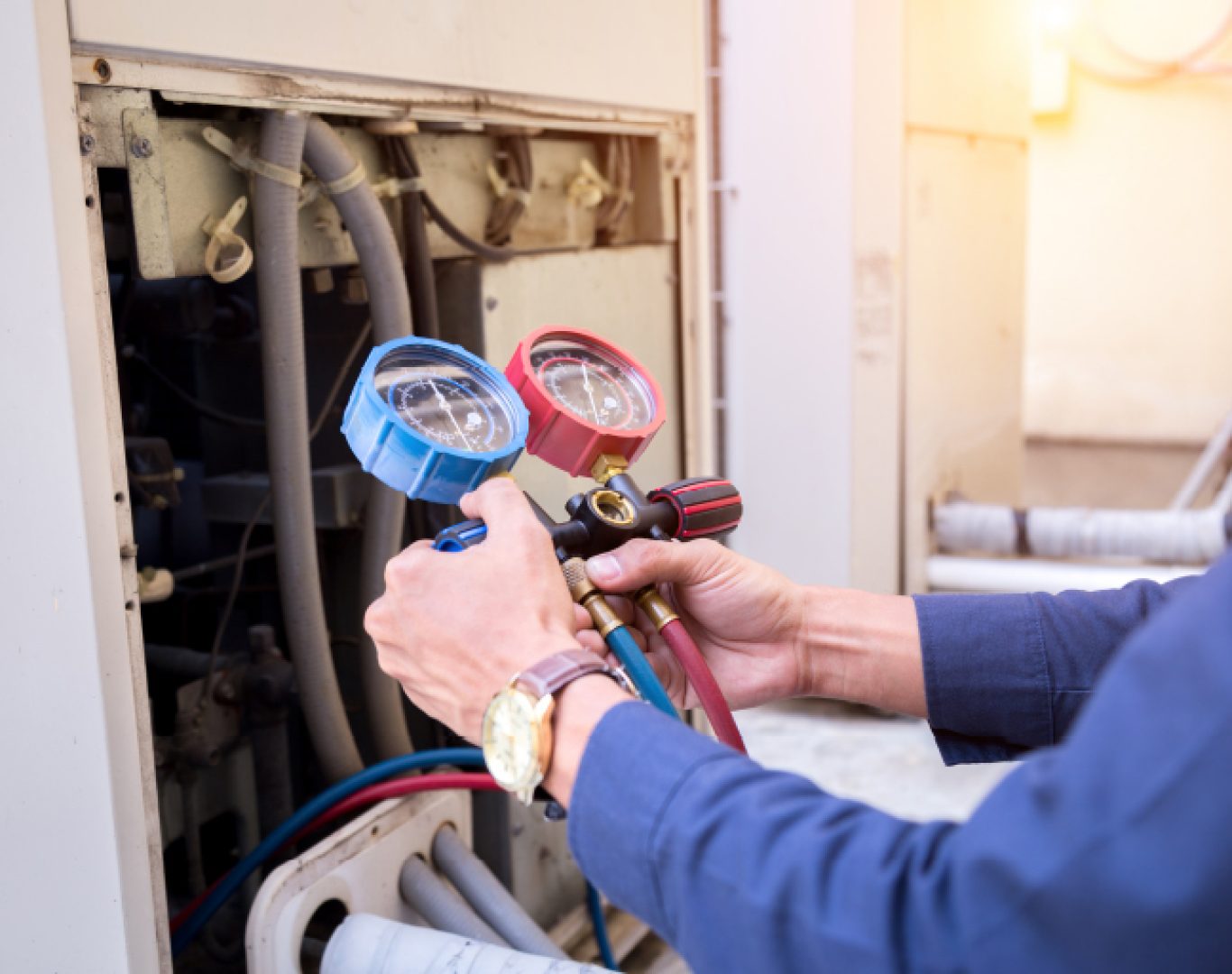 Pelican Heating & Air technician checking airflow