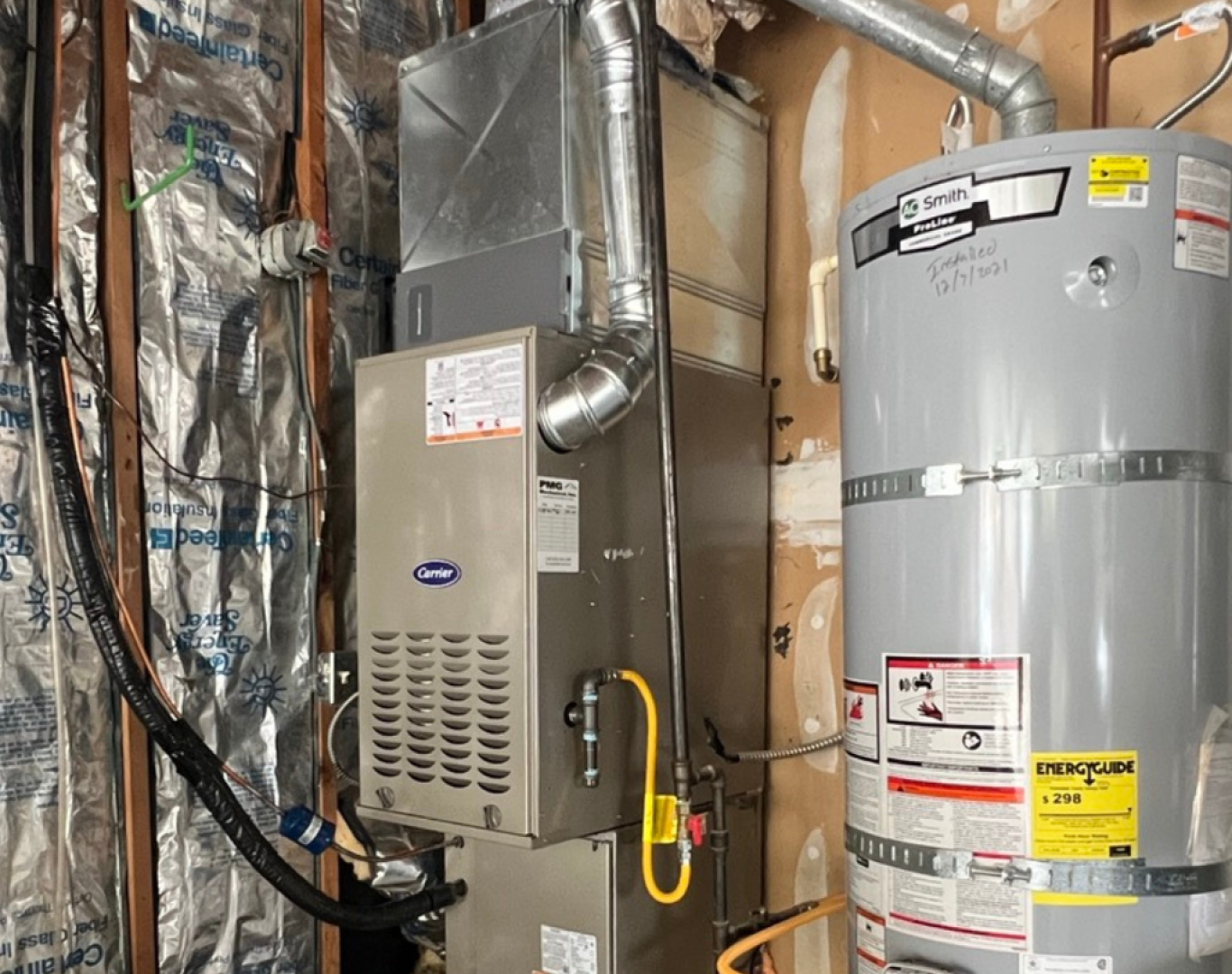 Pelican Heating & Air technician performing premium furnace cleaning in Redmond, WA home, ensuring efficiency and safety
