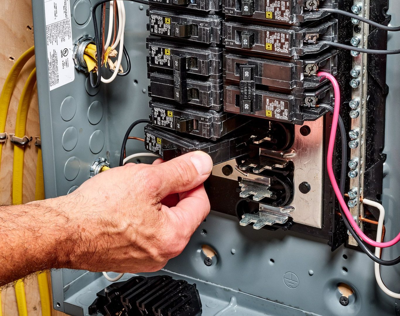 Redmond resident signing off on an AC repair estimate with HVAC tech