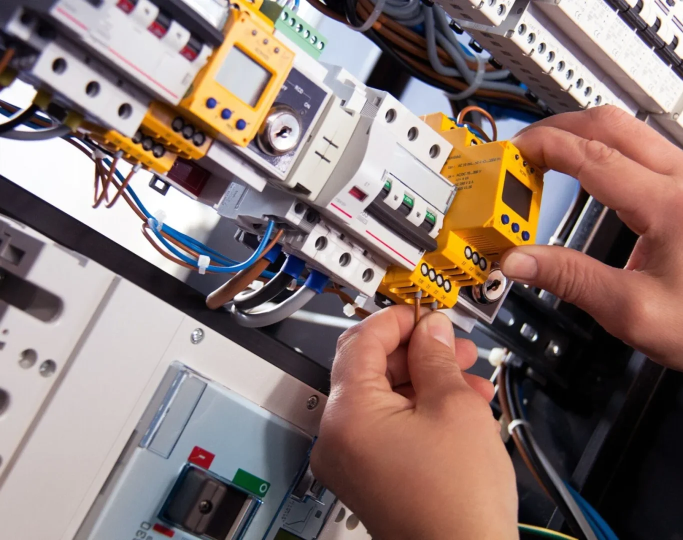 Technician from Pelican Heating & Air servicing air conditioner in Newcastle backyard